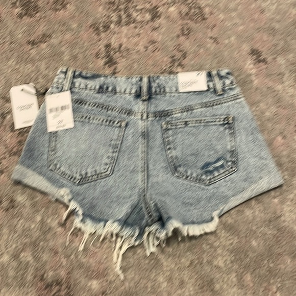 Distressed denim shorts - Picture 2 of 2